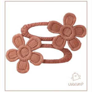 Bloemen speldjes koperoranje